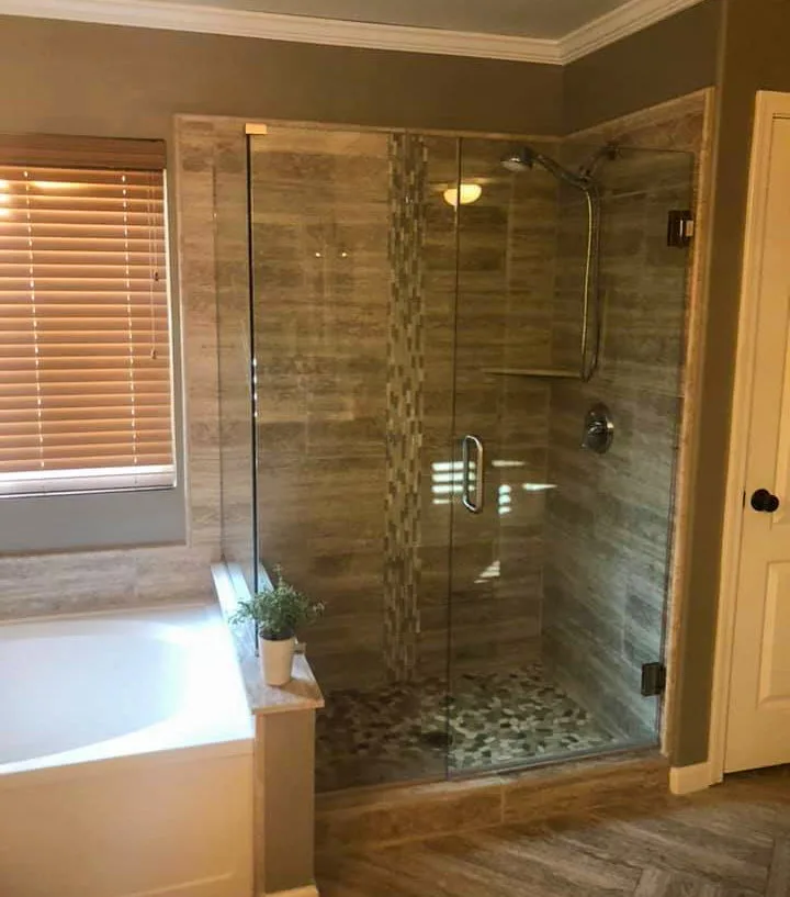 Finished tiled walk-in glass shower remodel by AHS Builders