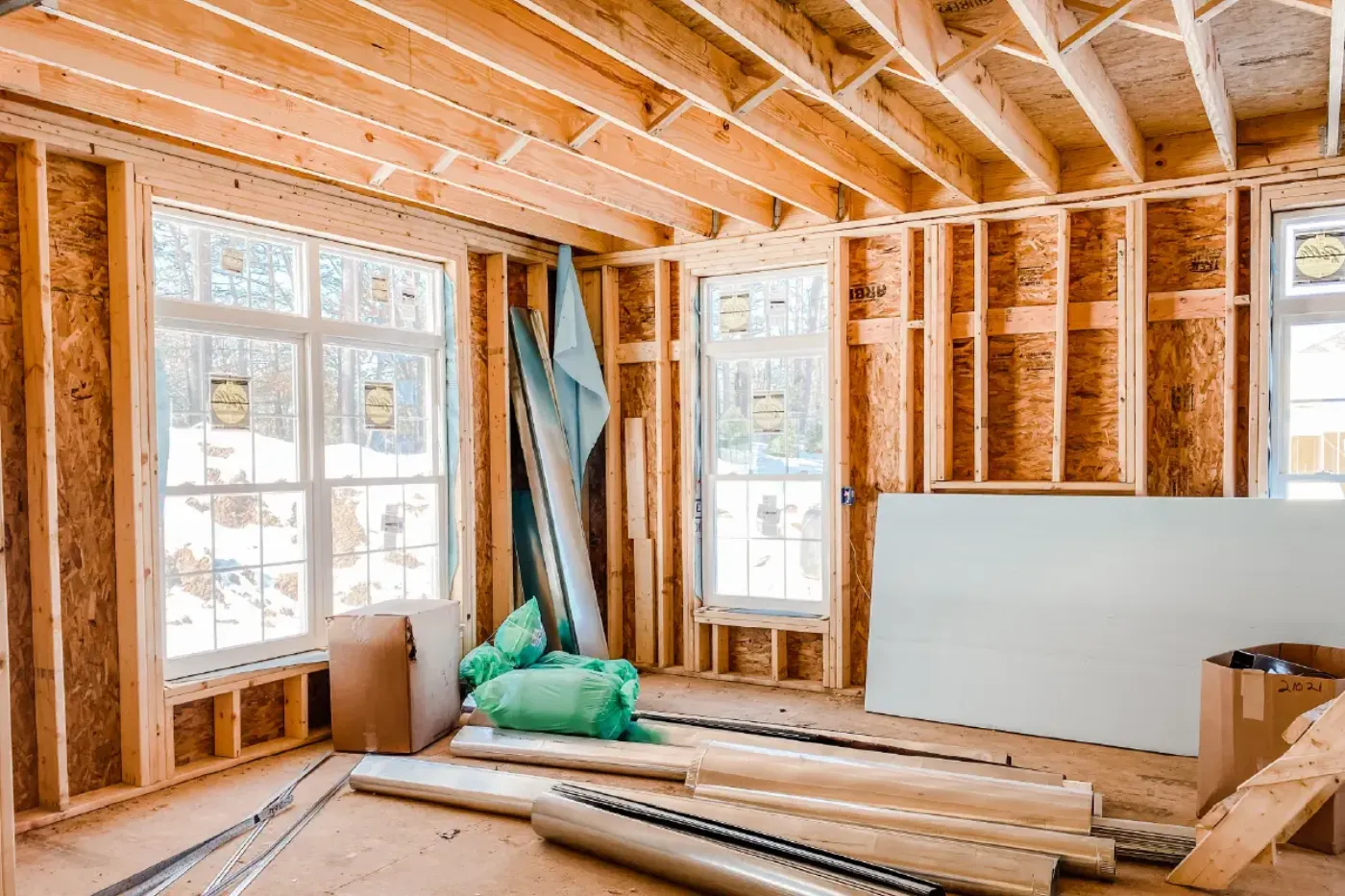 Framed room addition in progress by AHS Builders